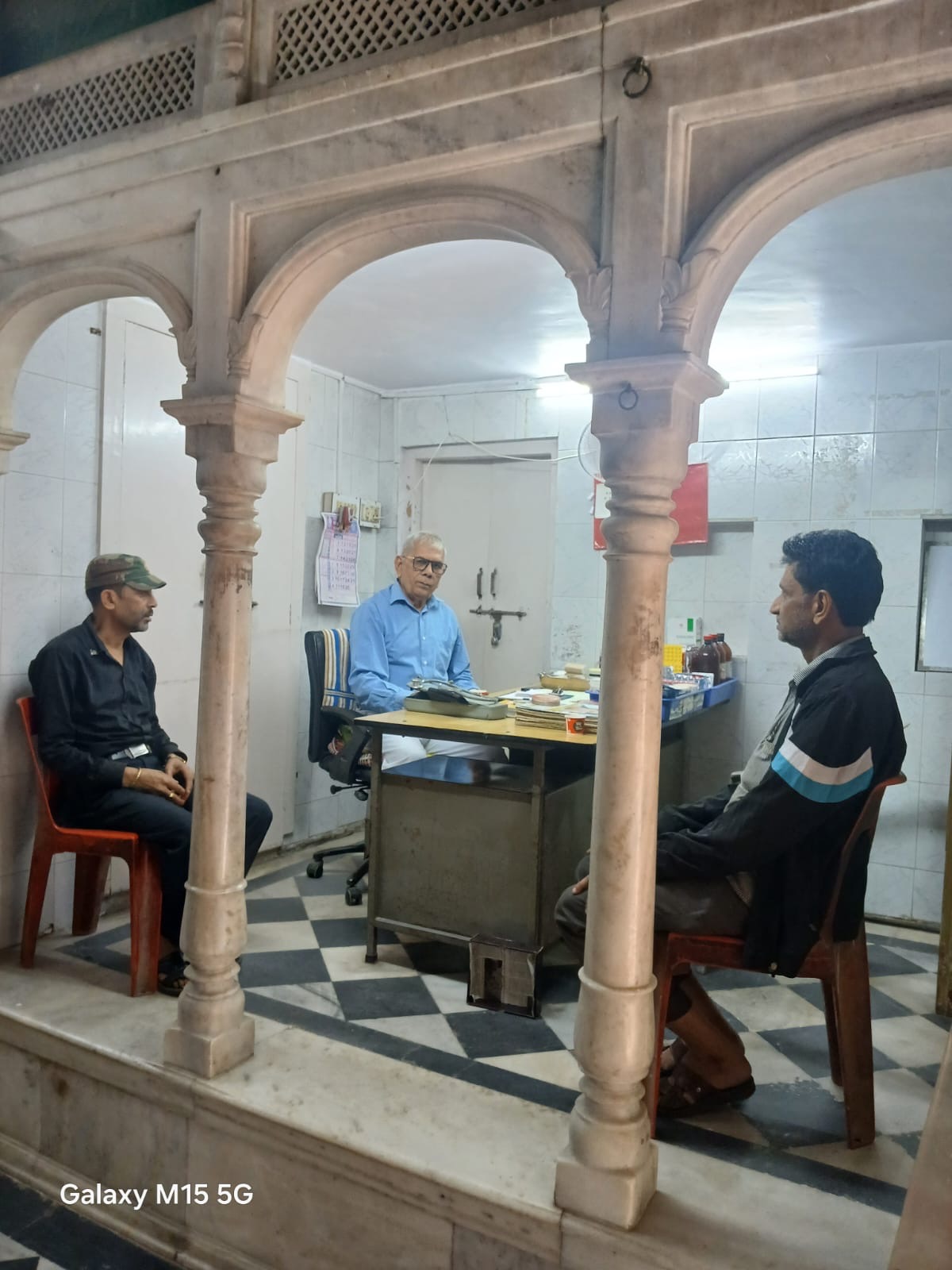 Doctor consulting patients at BMG Foundation dispensary